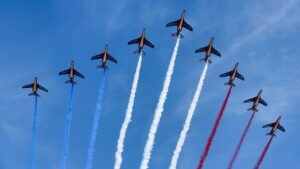 Jets leaving a trail behind them with the colors of the French flag.