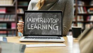 A laptop with the message Never Stop Learning.