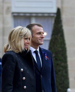 Macron and his wife Brigitte dressed both in black.