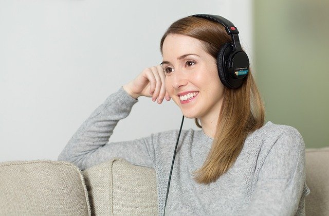 Young woman wearing headphones.