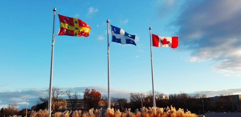 Canada and Quebec flags.
